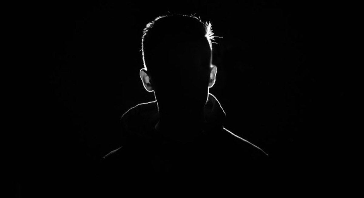 A man portrait in the dark with Silhouette