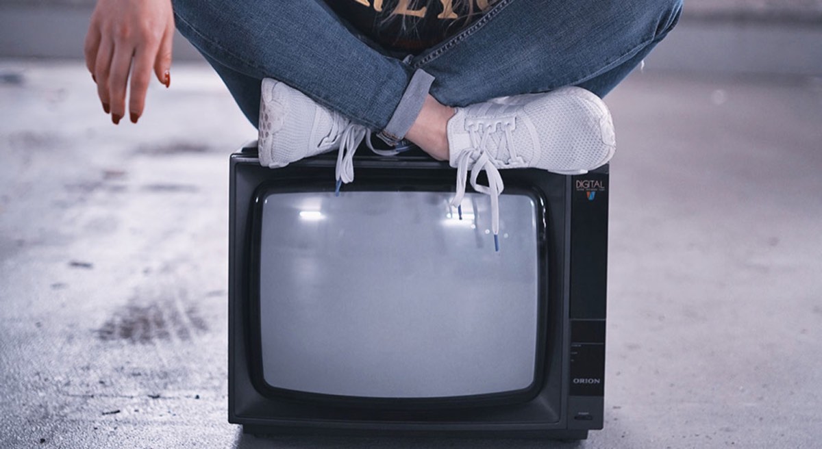 girl sit on tv