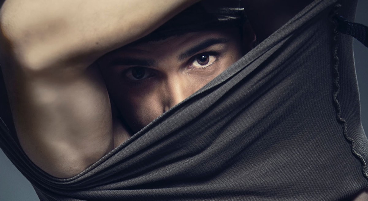 Man taking shirt off