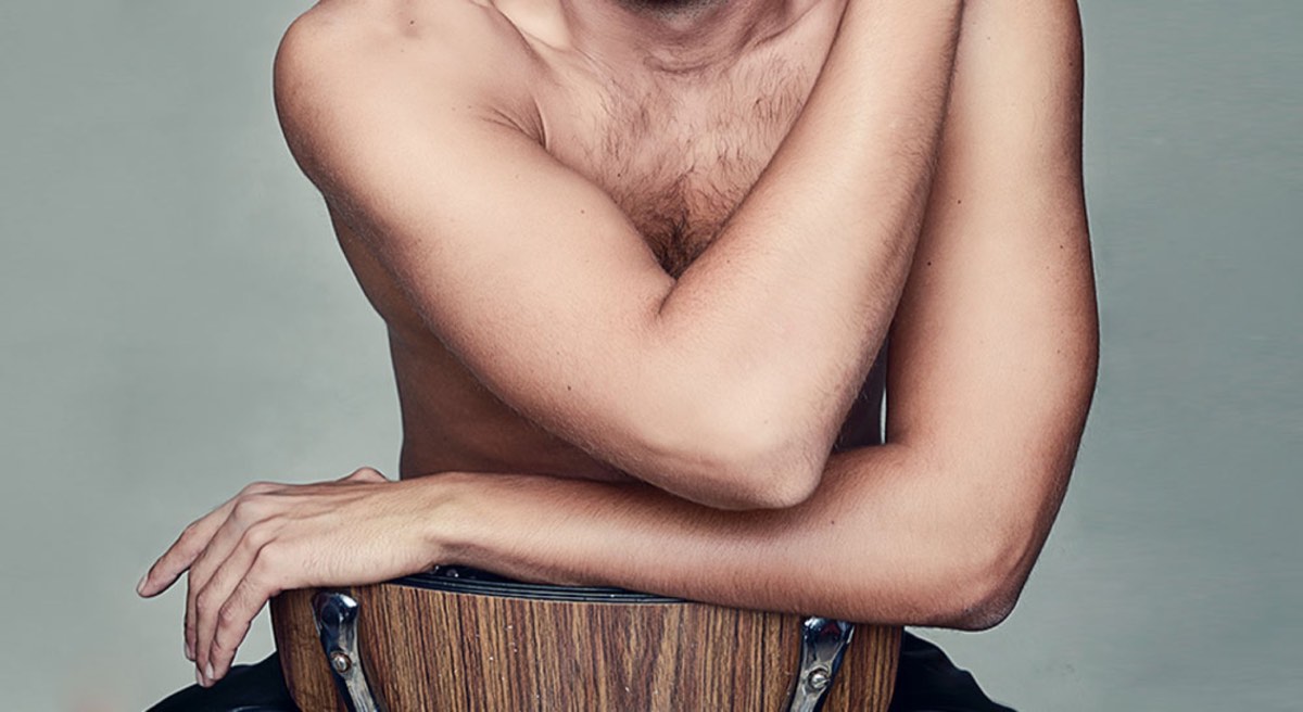 man sit on chair