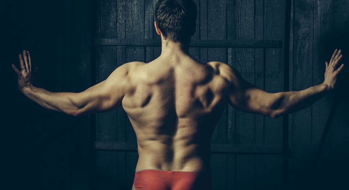back of a man in red underware