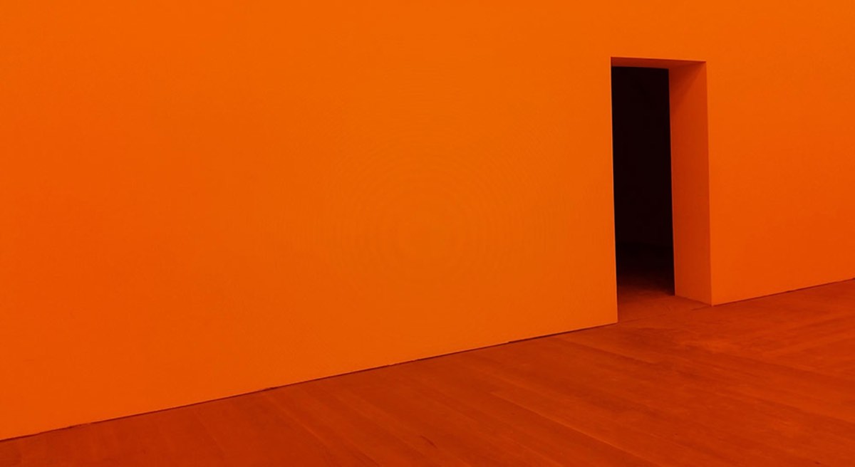Orange room with open door
