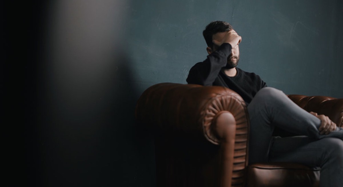 Man sitting on Sofa