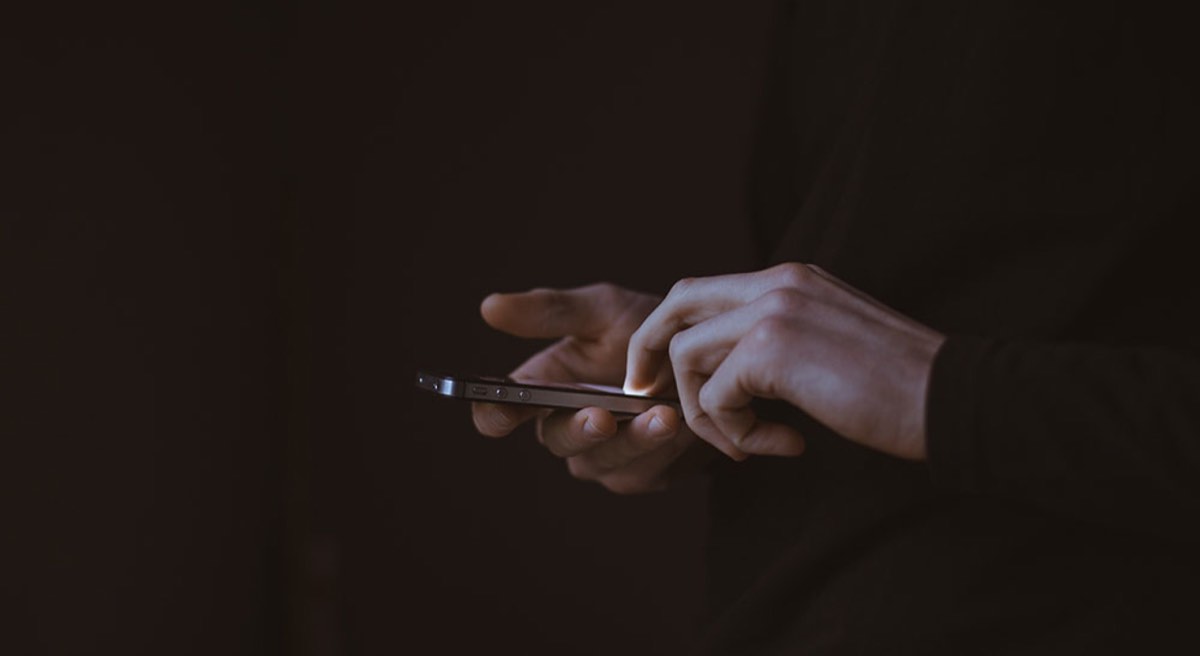 man using smartphone